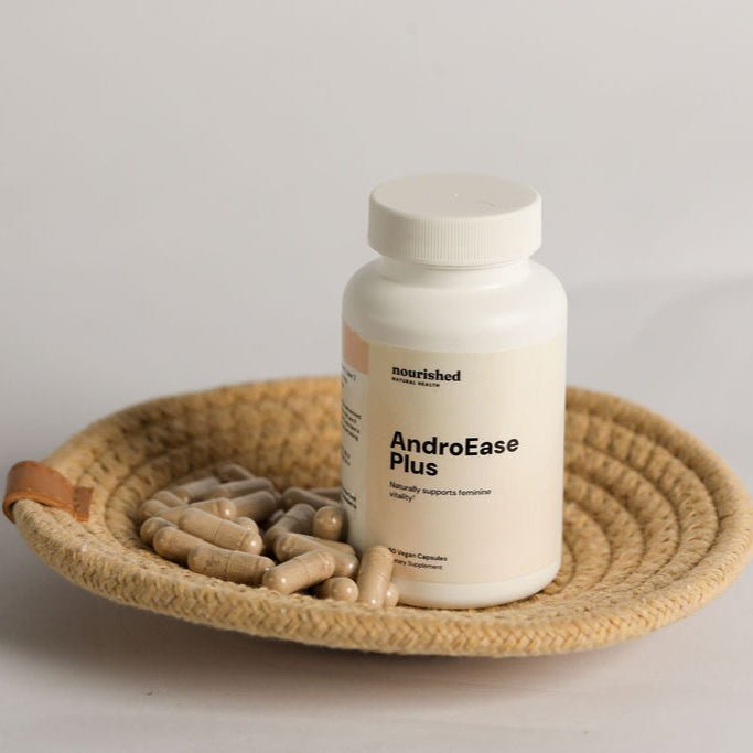 AndroEase Plus supplement bottle with capsules in a woven dish